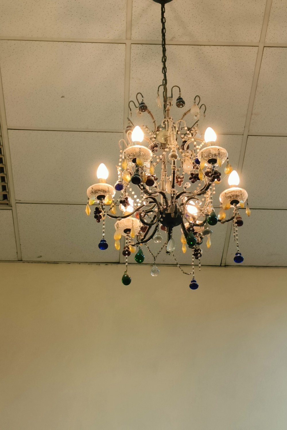 Statement chandelier glowing over a dining table