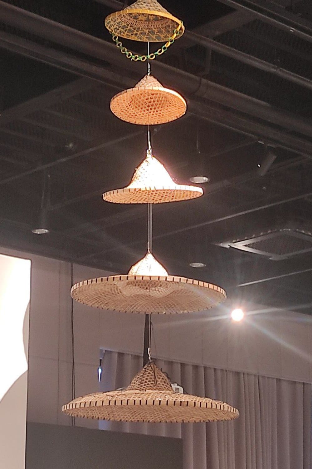 Warm layered lighting over a dining table